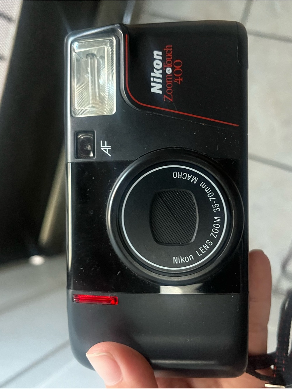 Nikon Black Point-and-Shoot Zoom Touch 400 Camera with Red Accent
